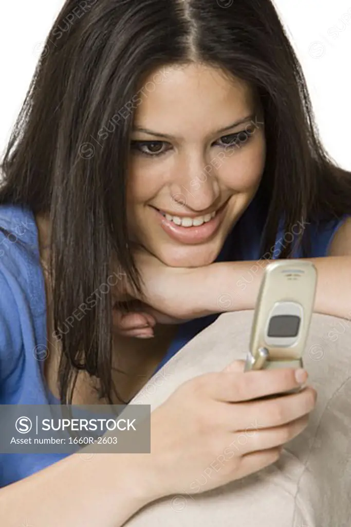 Close-up of a young woman using a mobile phone