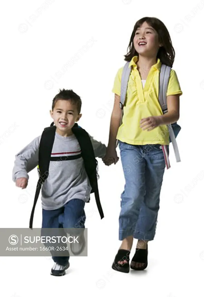 Portrait of a brother walking with his sister