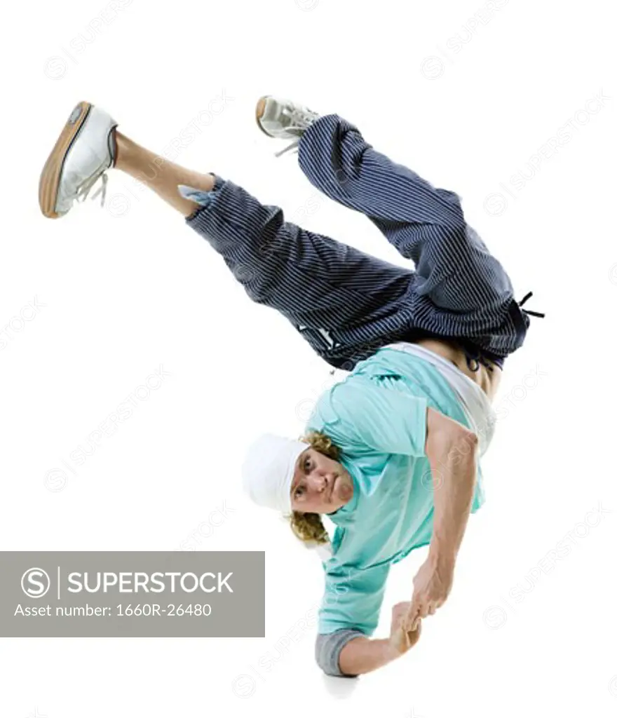 Portrait of a young man break dancing