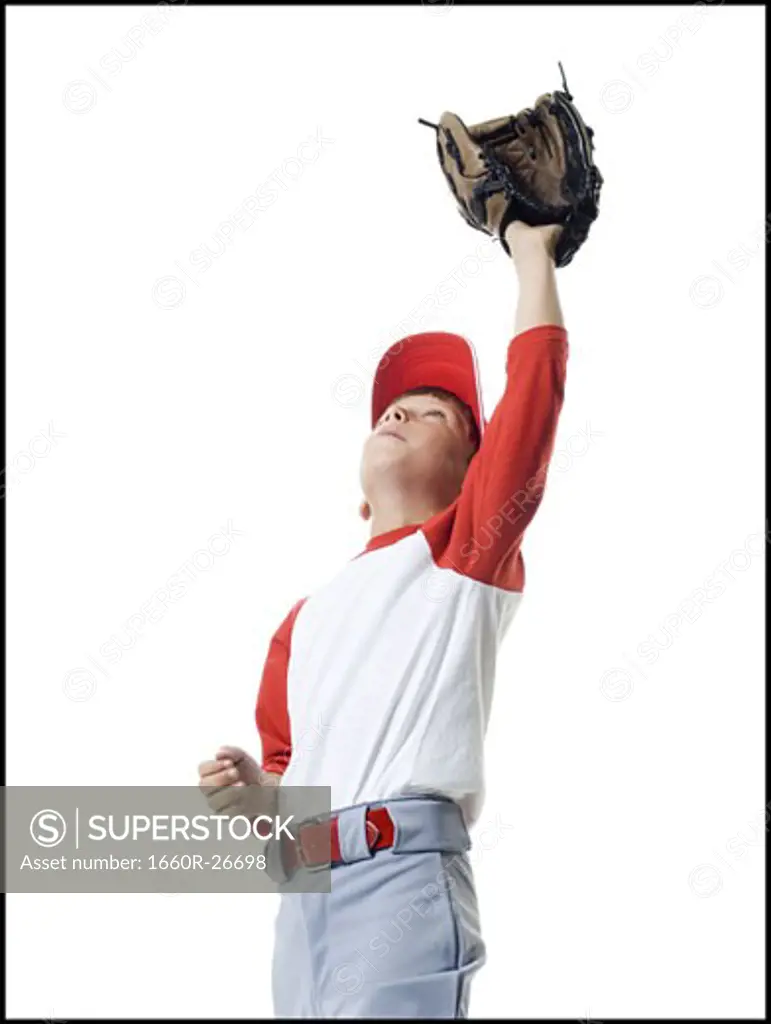 Close-up of a baseball player catching a baseball