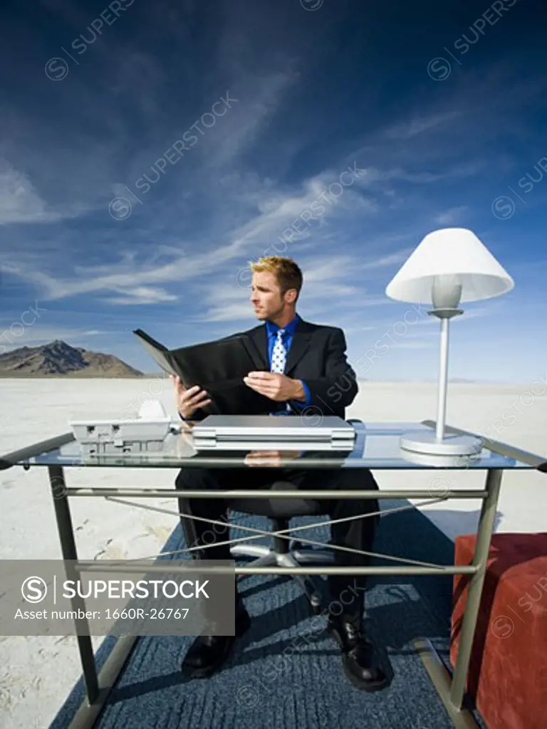 Businessman reading a file