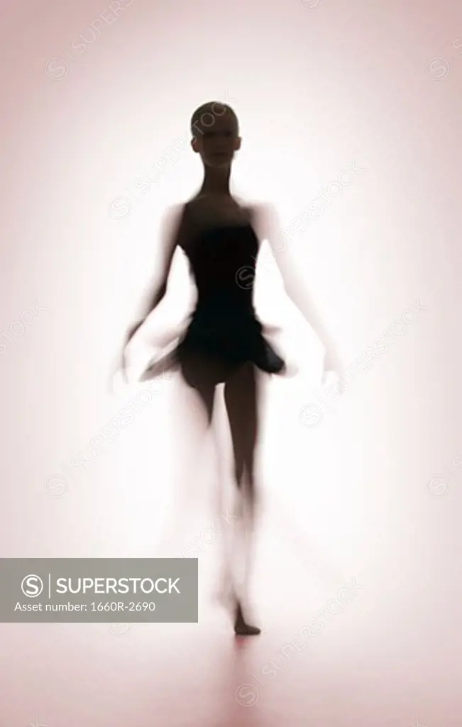 Silhouette of a female ballerina standing