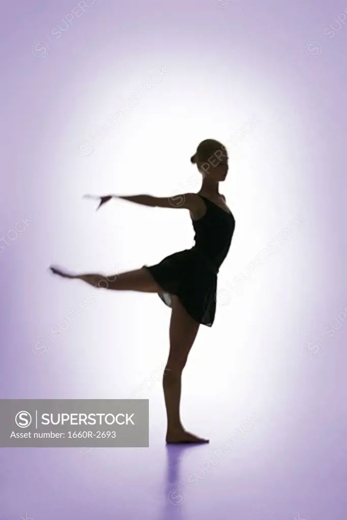 Silhouette of a female ballerina performing ballet