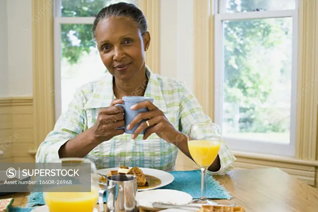 Portrait of a senior woman having breakfast