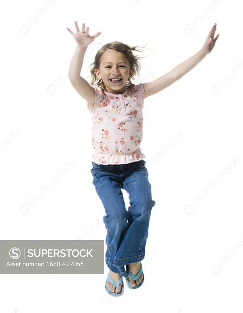 Portrait of a girl jumping with joy