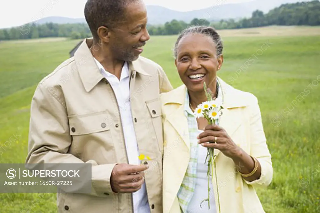 Portrait of a senior man and a senior woman smiling