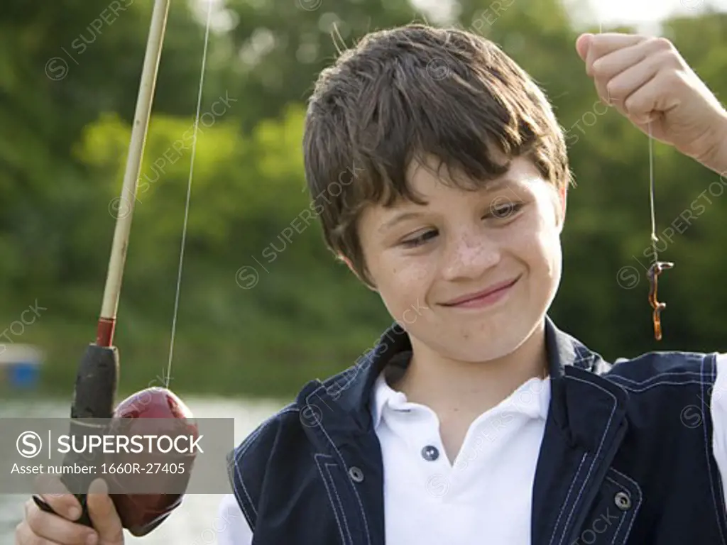 Portrait of a boy fishing