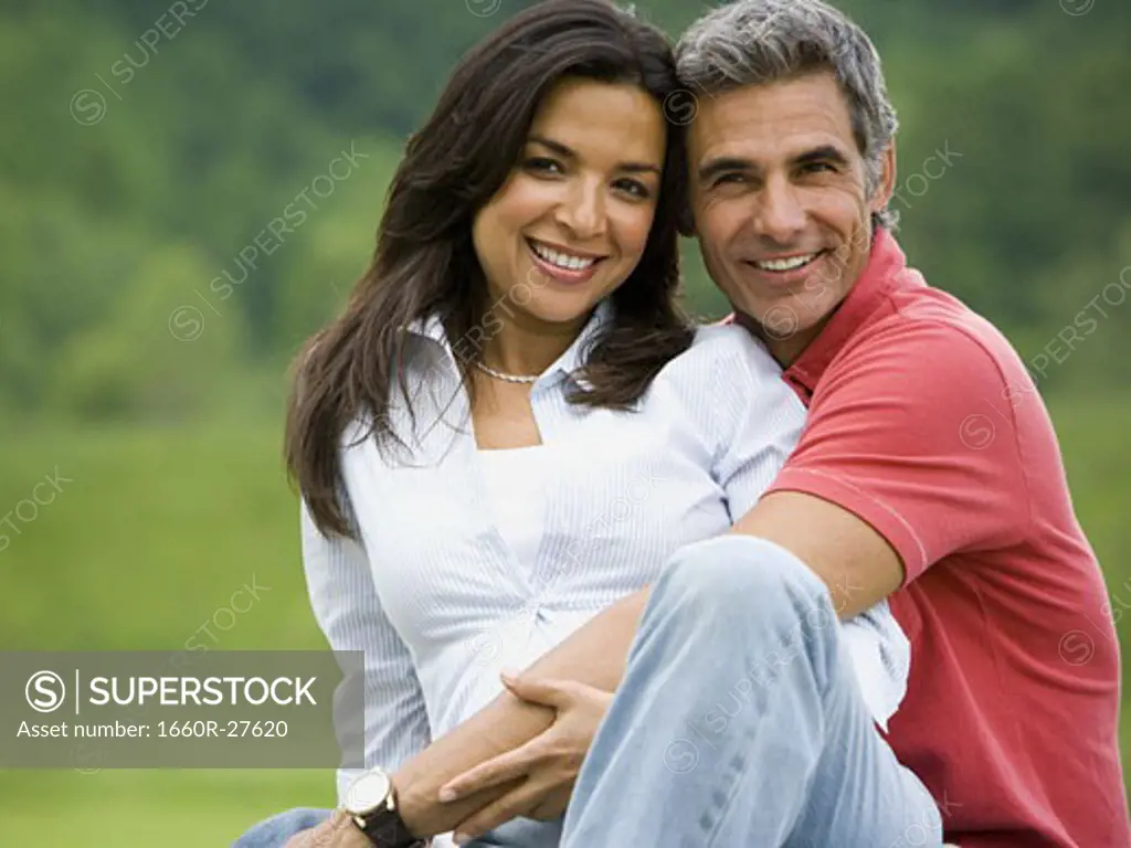 Portrait of a man and a woman smiling
