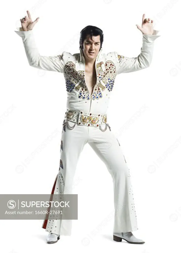 An Elvis impersonator dancing