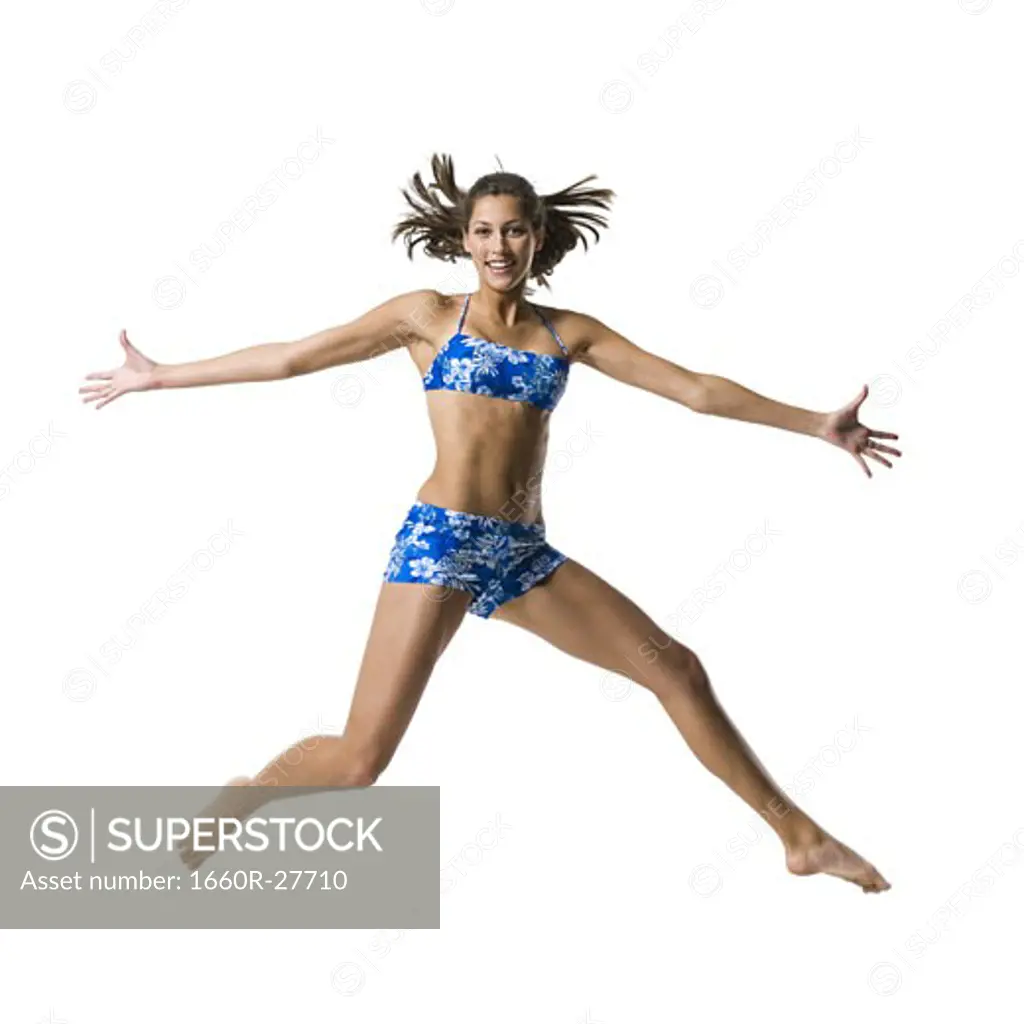A young woman jumping