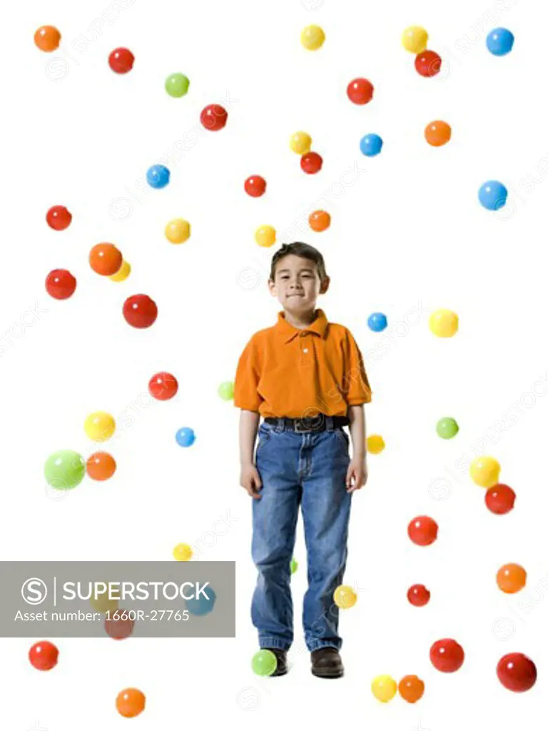 Boy playing with colored balls