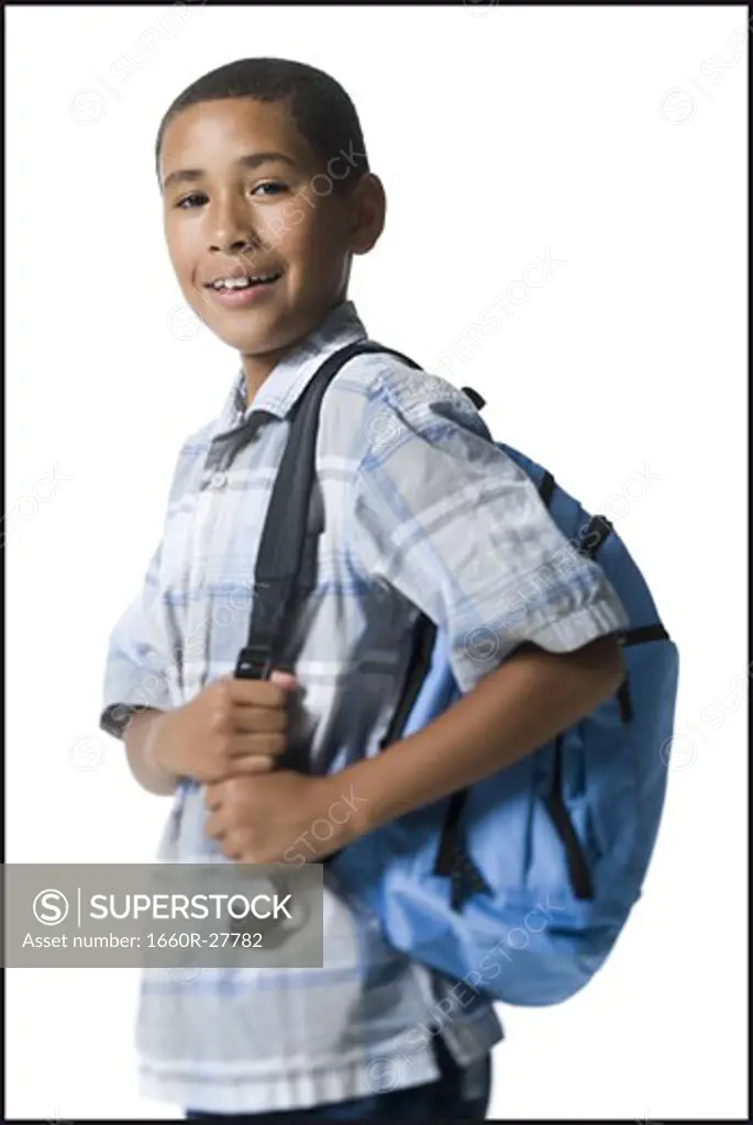 Portrait of a smiling boy with a backpack