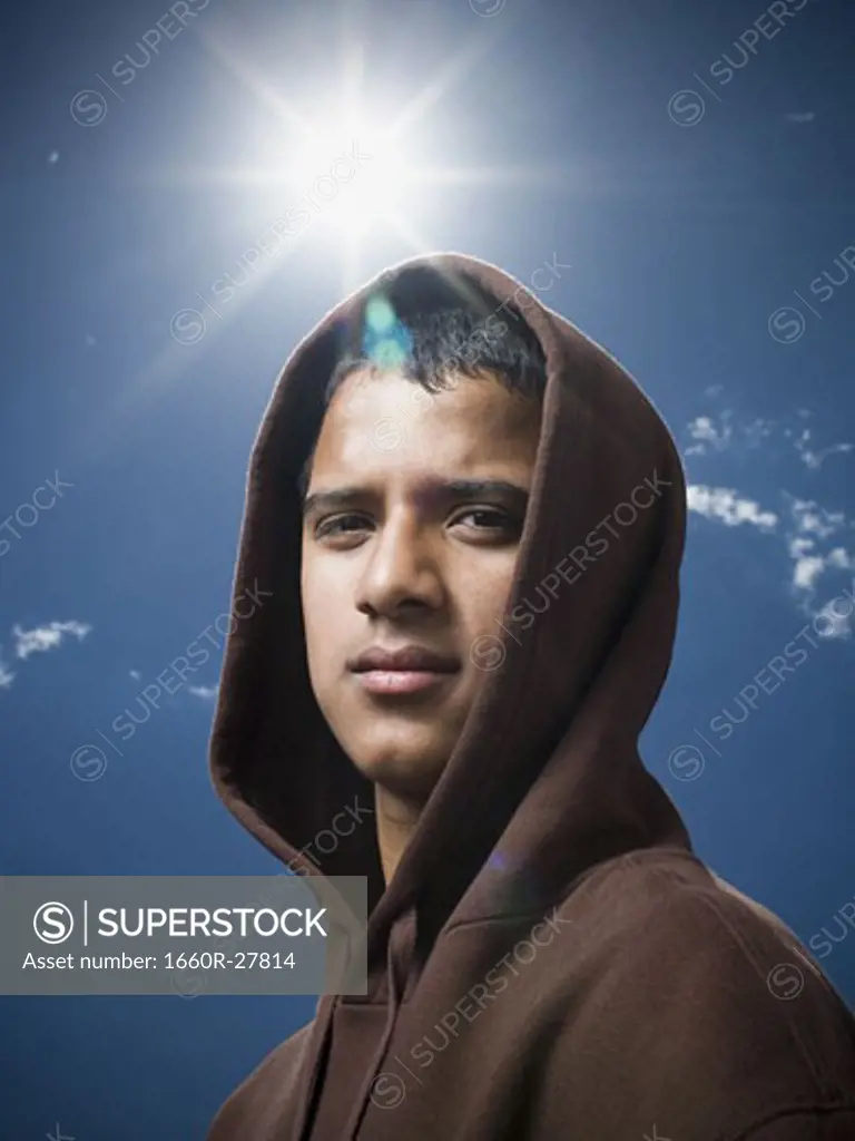 Portrait of a teenage boy wearing a hoodie