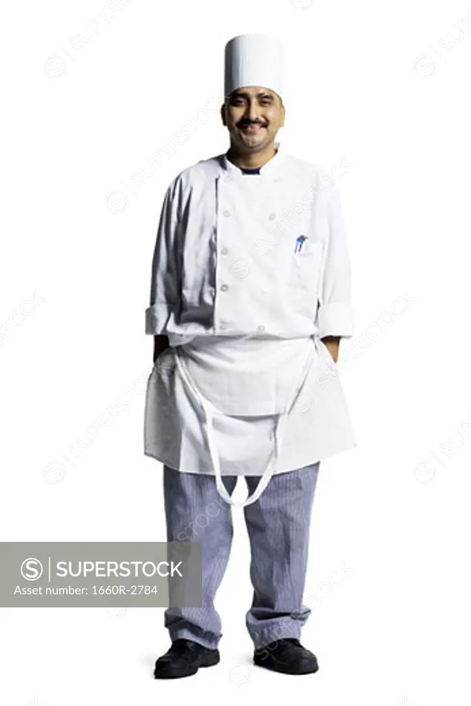 Portrait of a male chef standing with his hands in his pockets