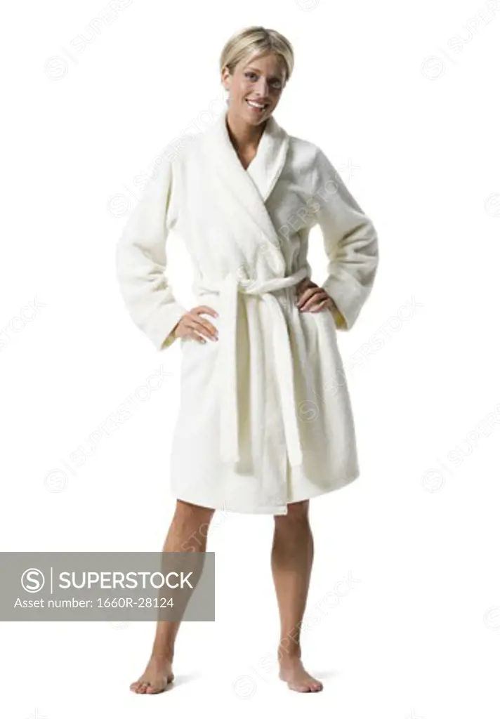 Portrait of a young woman standing in bathrobe