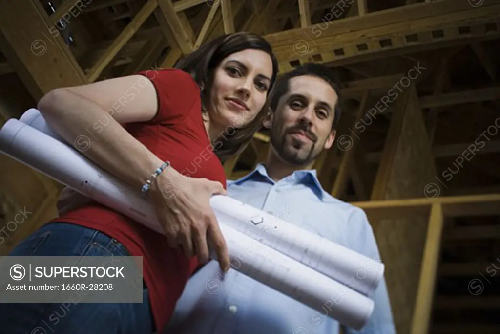 Low angle view of a young couple smiling