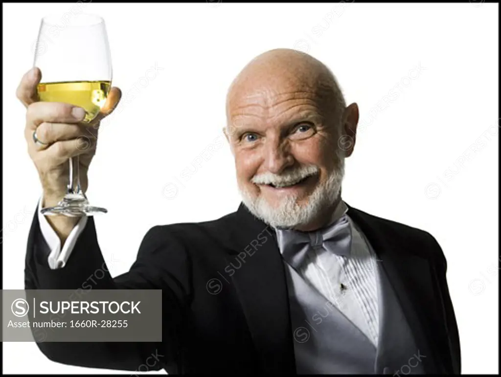 Portrait of a senior man holding a glass of wine
