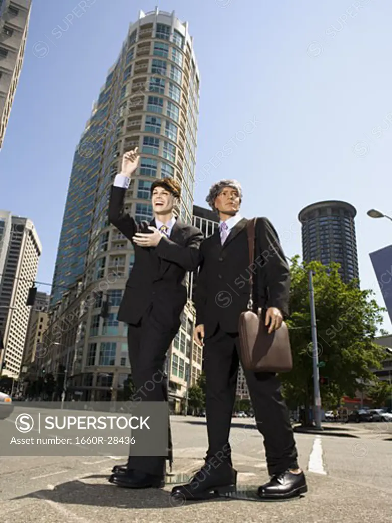 Two mannequins portraying businessmen
