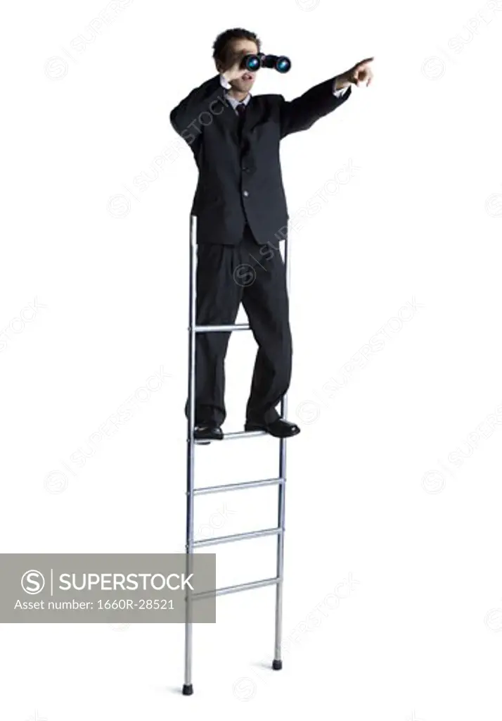 Businessman on corporate ladder looking through binoculars
