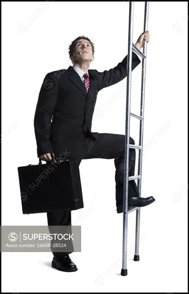Businessman climbing corporate ladder