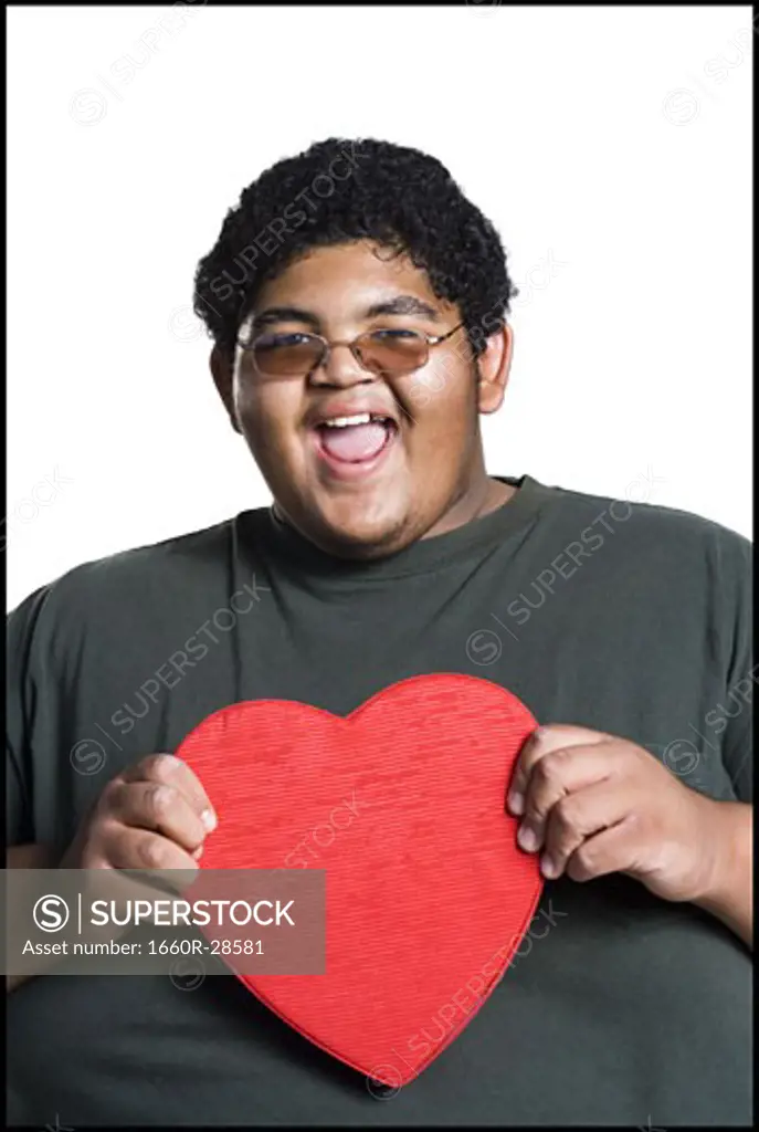 Heavyset young man with valentine box