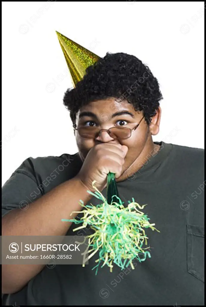 Heavyset young man celebrating birthday