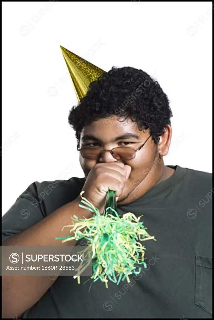 Heavyset young man celebrating birthday