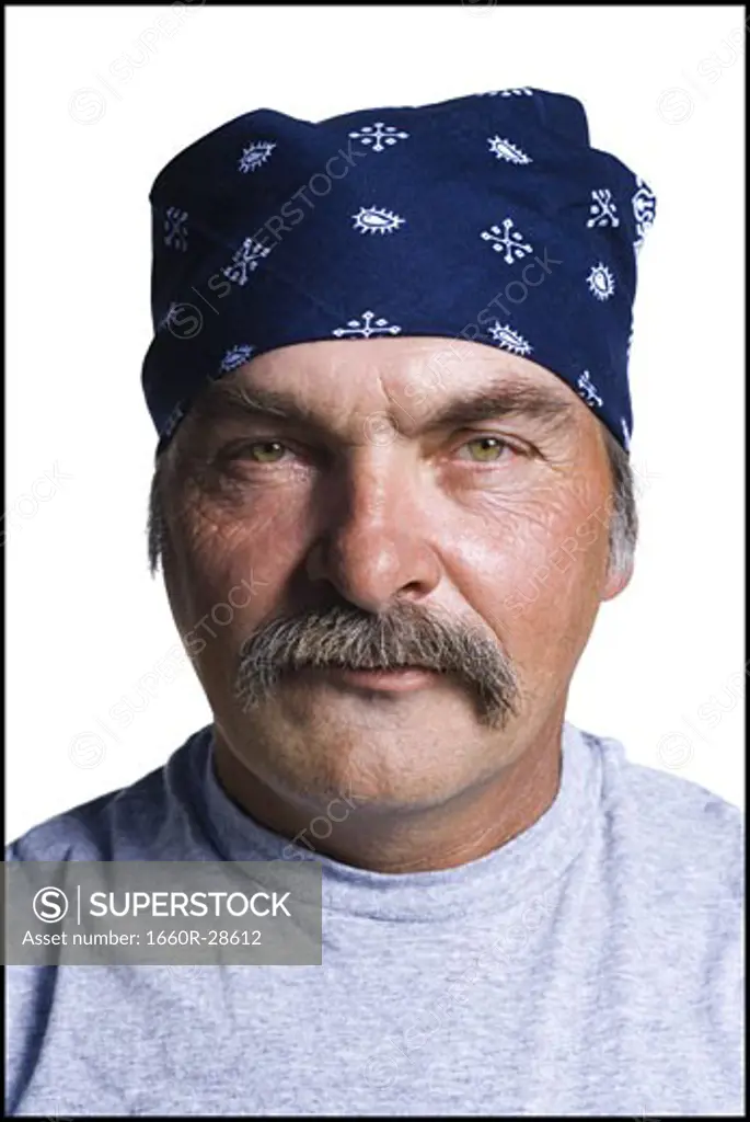 Disheveled middle aged man with head scarf