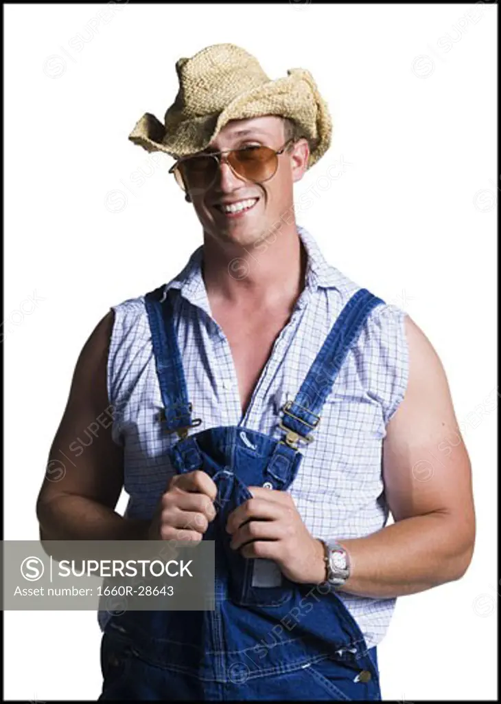 Farmer wearing a straw hat with sunglasses