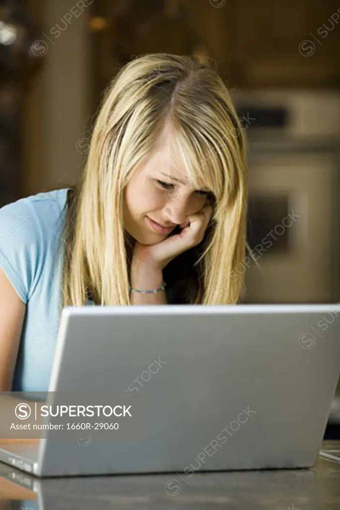 Young woman working on a laptop computer