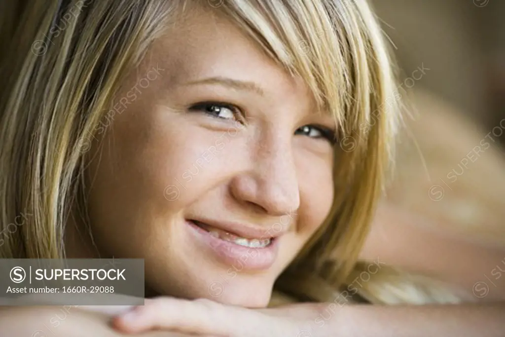Close-up of smiling young woman