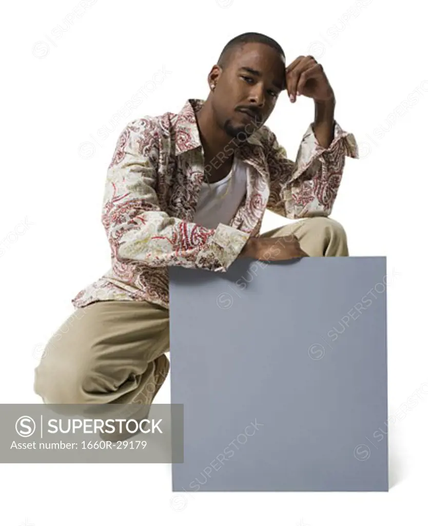 African American man holding a blank sign