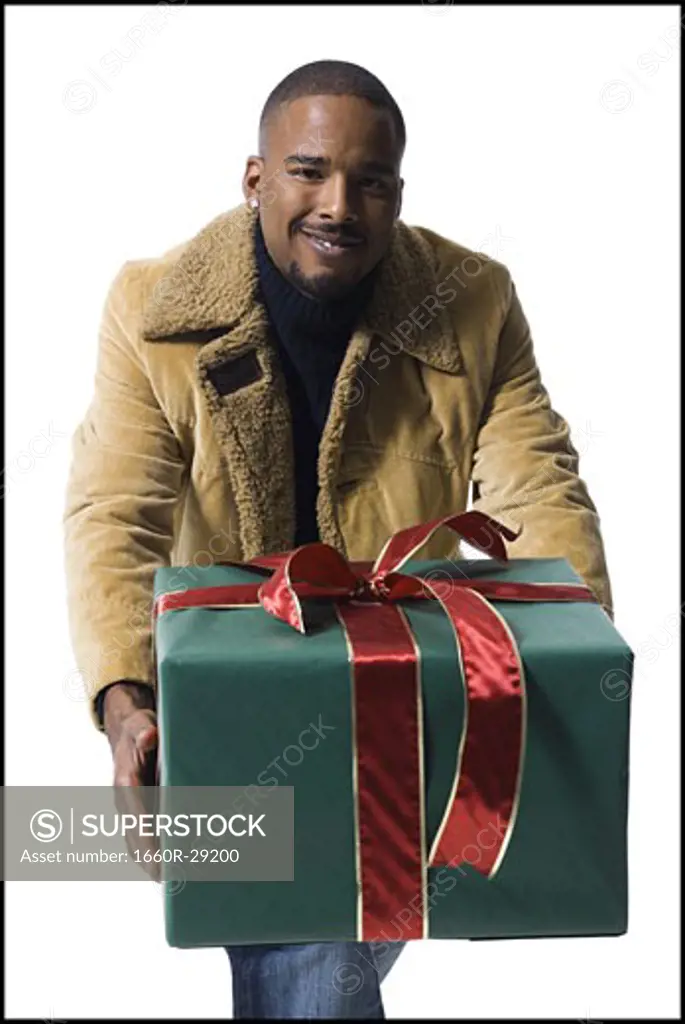 African American man with Christmas gift