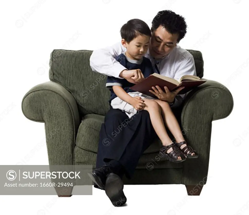 Father reading story to son
