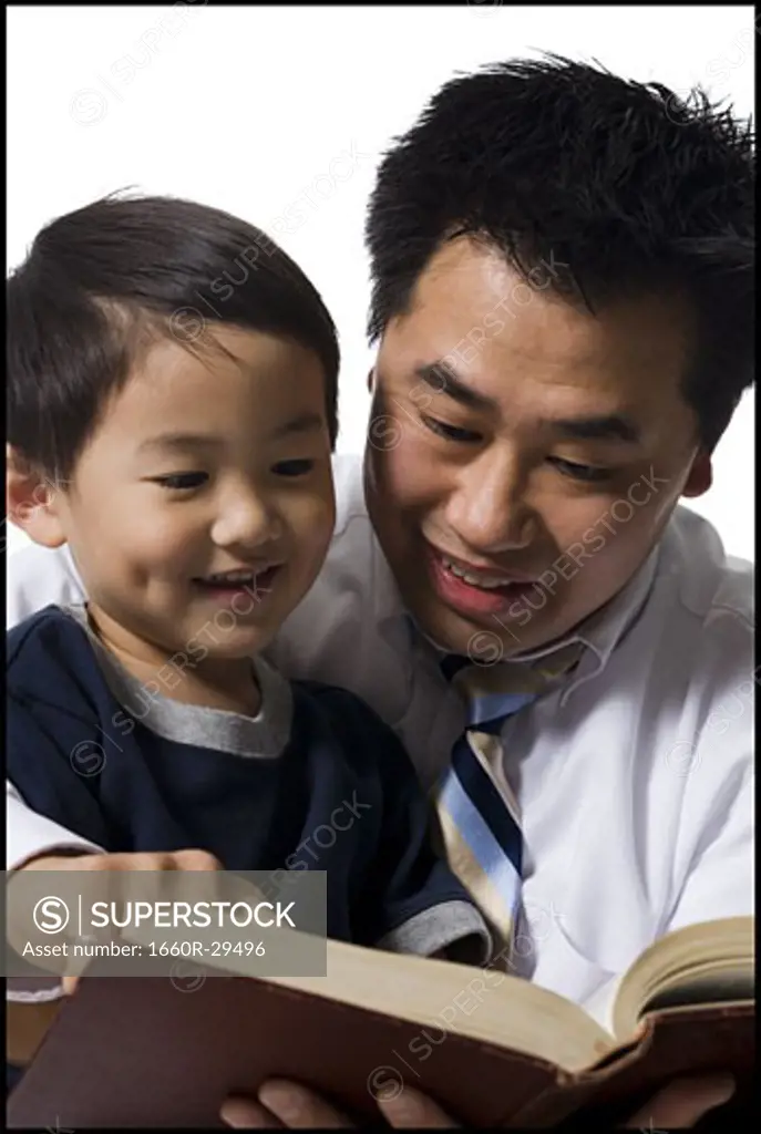 Father reading story to son