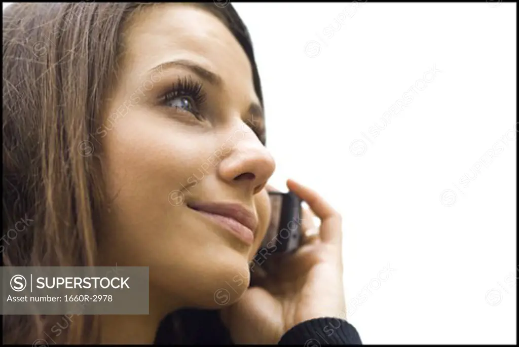 Close-up of a young woman using a mobile phone