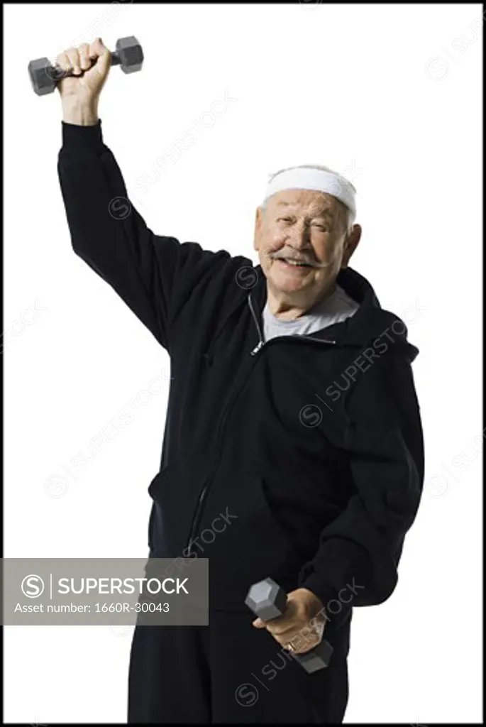 Older man doing dumbbell exercises
