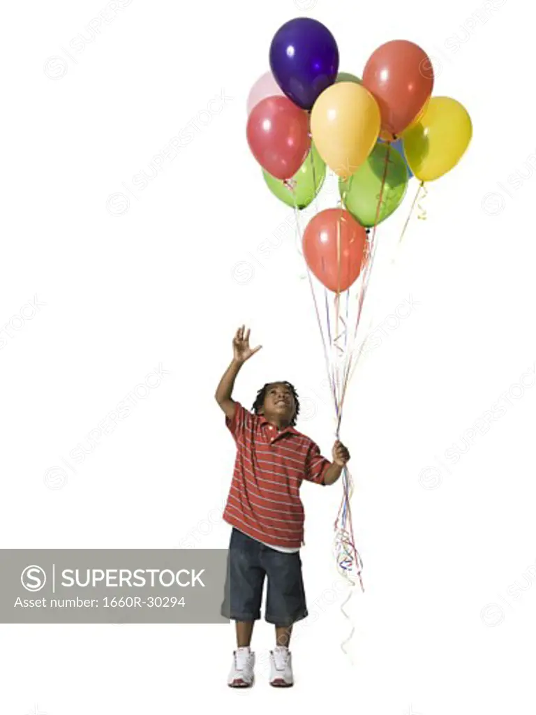 Young boy with balloons