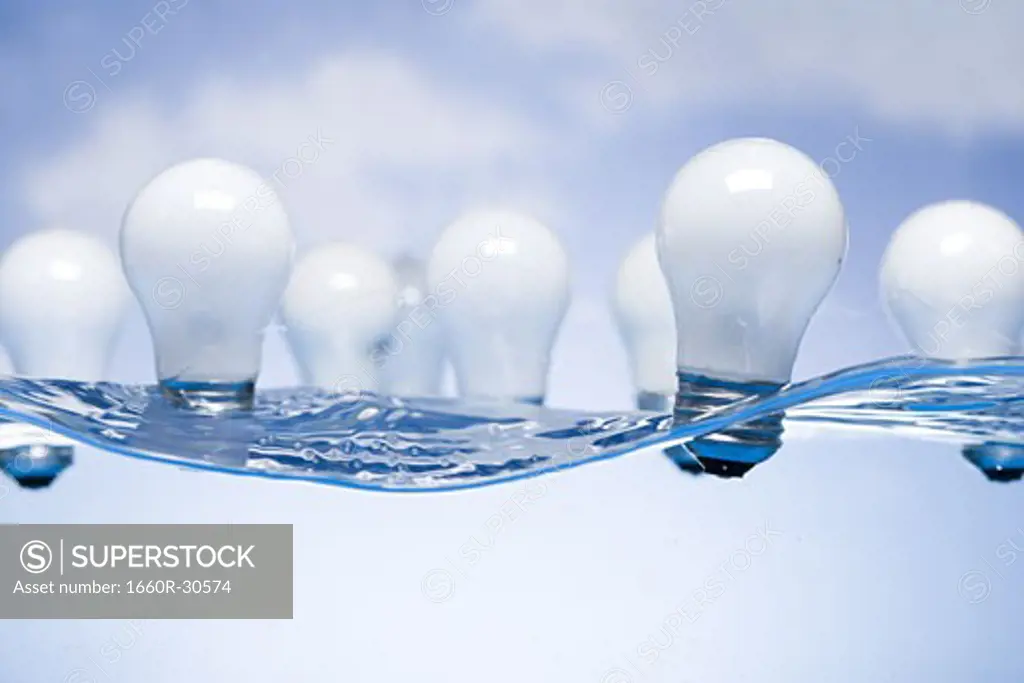 Light bulbs floating in water
