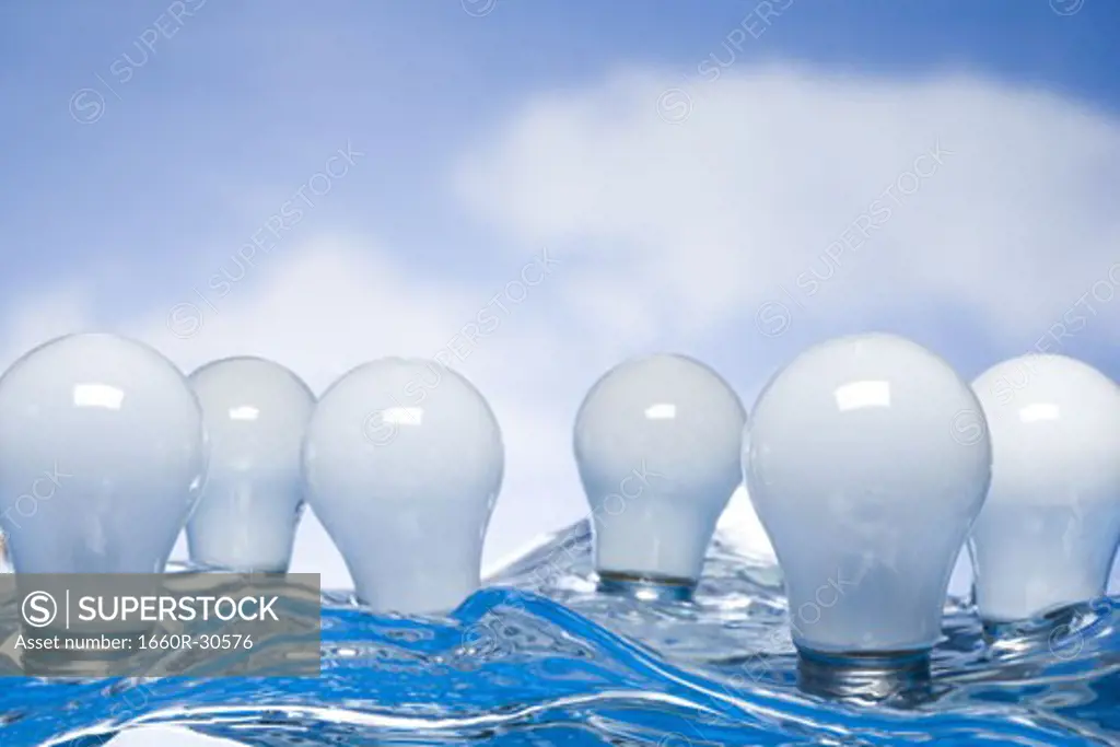 Light bulbs floating in water