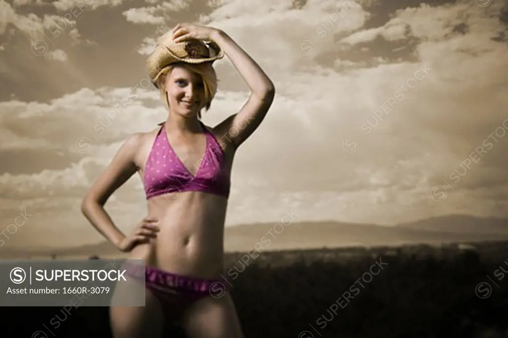 Portrait of a young woman in a bikini