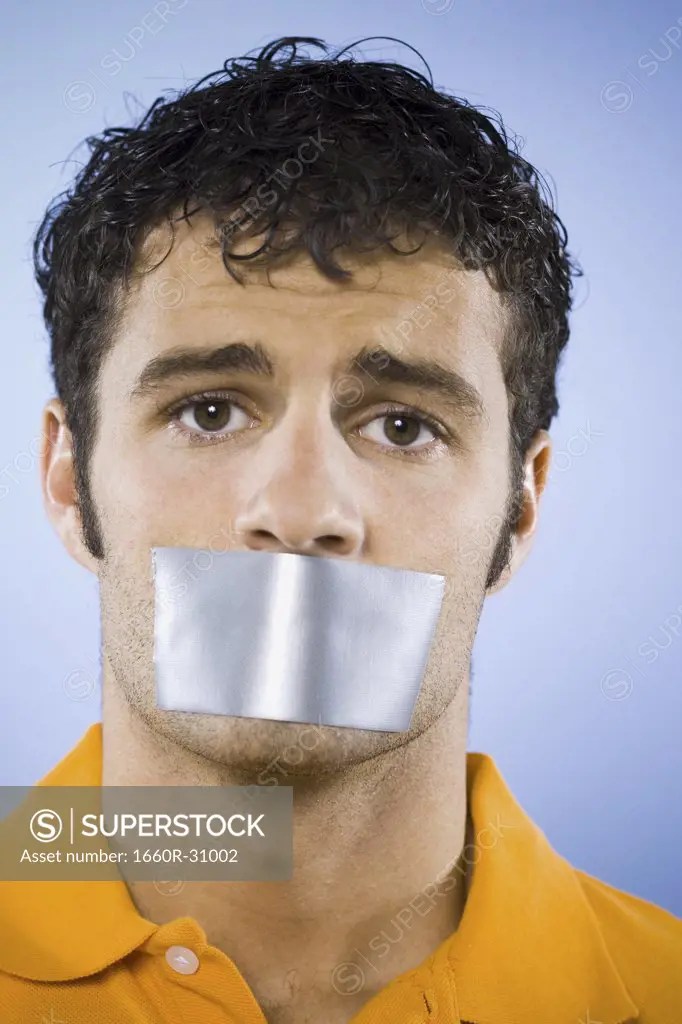 Man with duct tape covering mouth