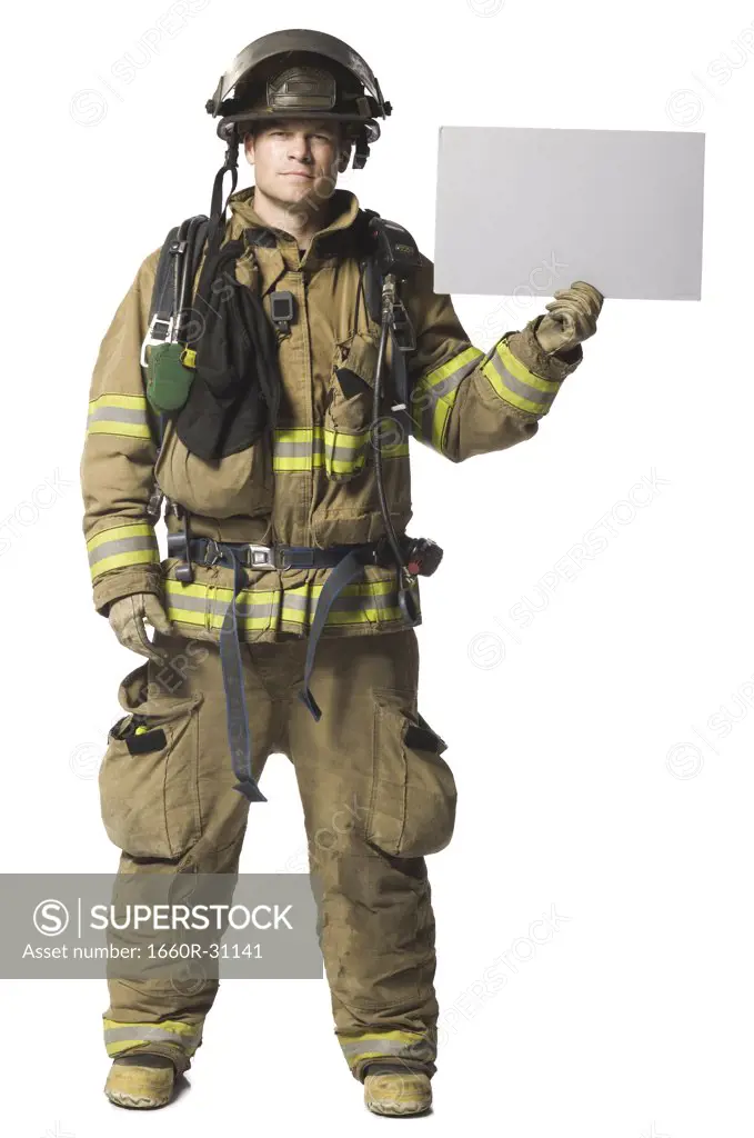 Portrait of a firefighter with blank sign