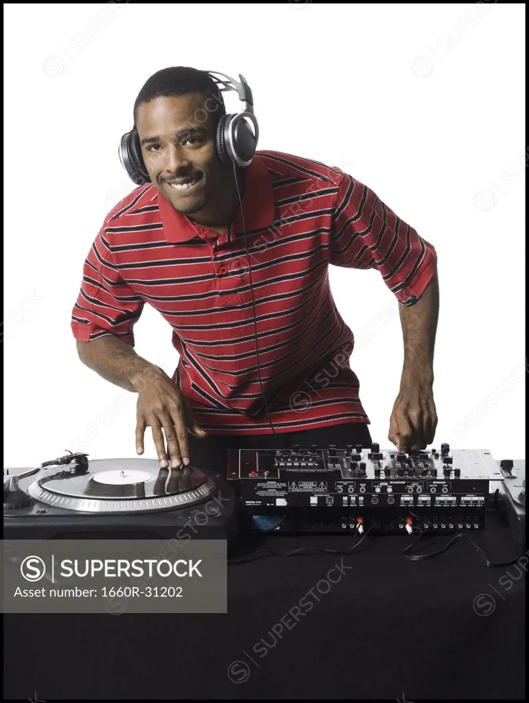 DJ with headphones spinning records