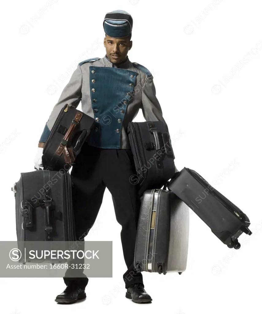 Bellboy with luggage struggling