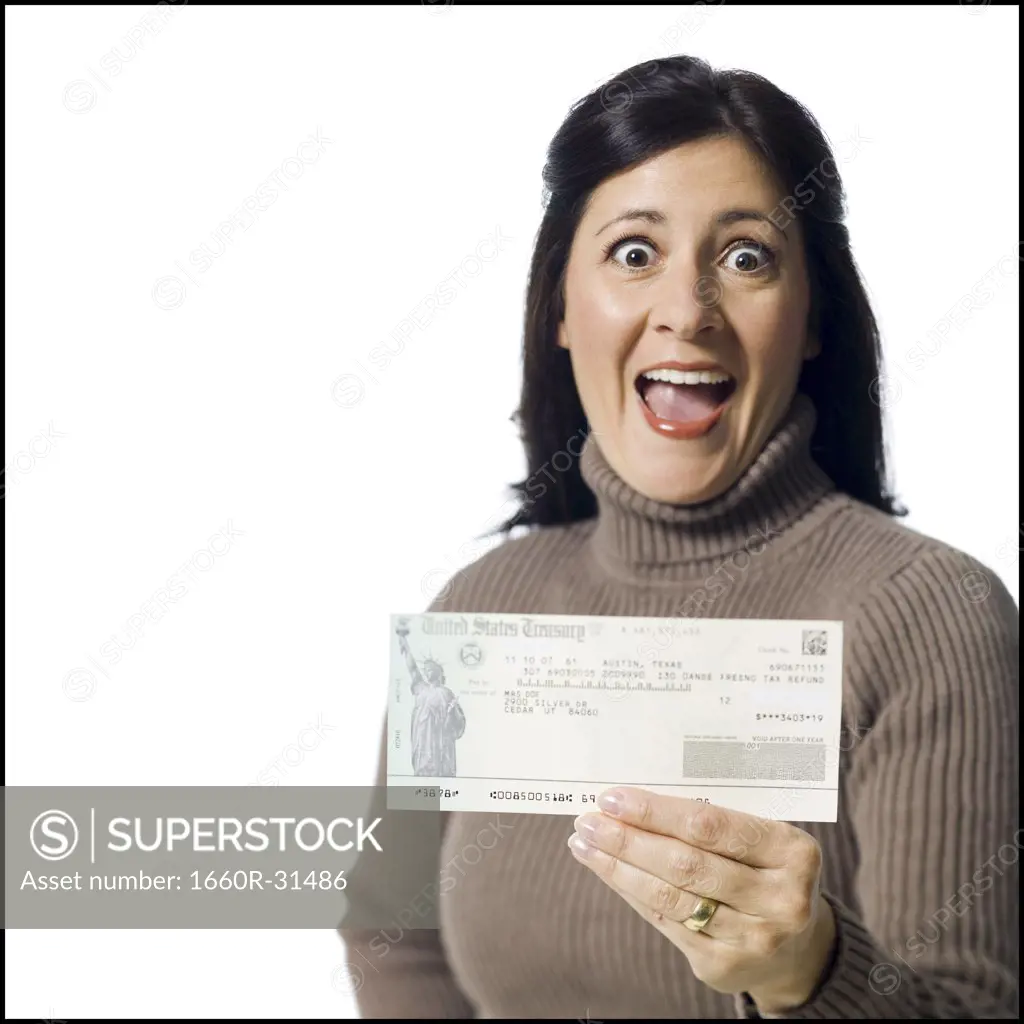 Woman holding cheque from US Treasury