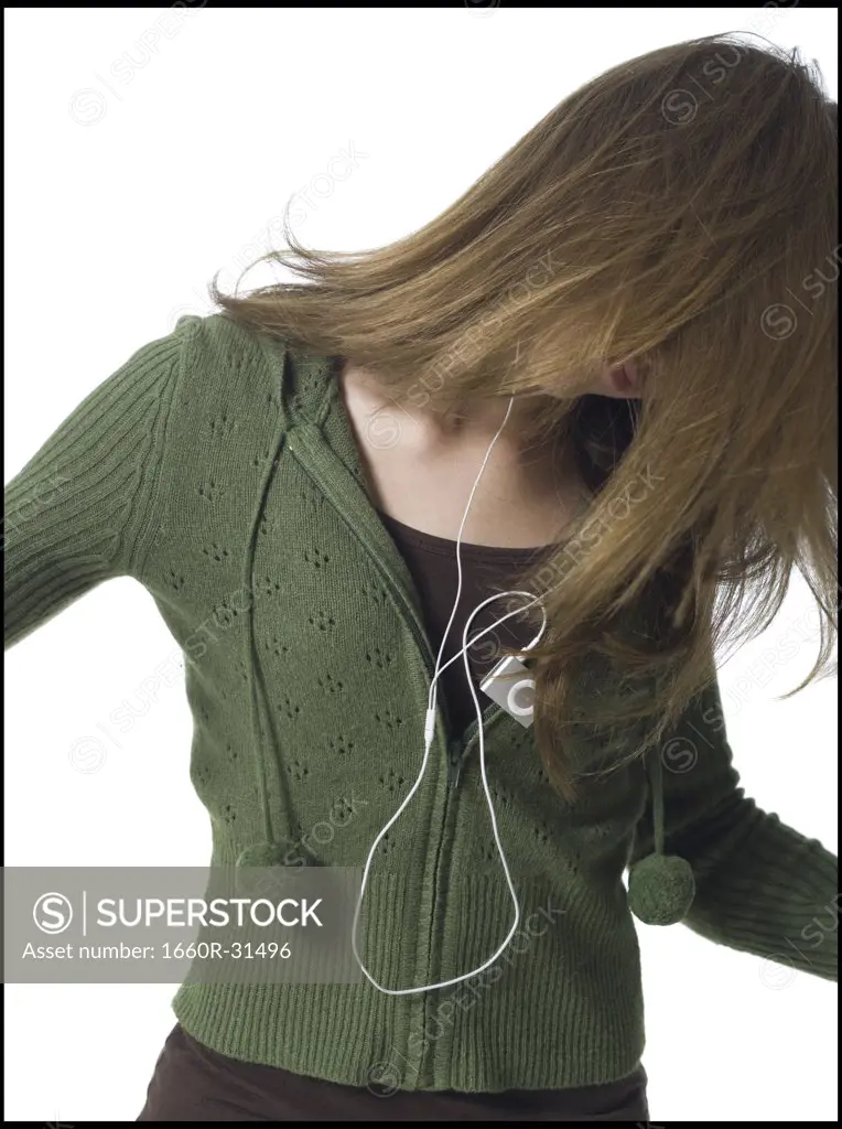Girl with mp3 player dancing
