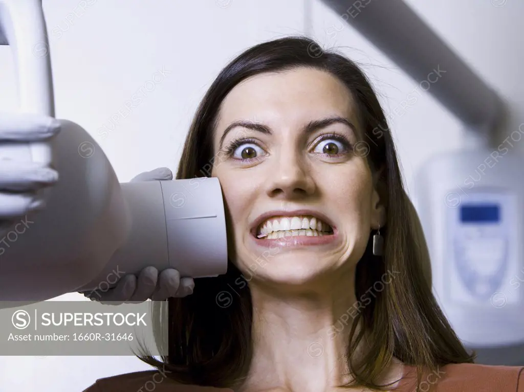 Woman having dental x-rays