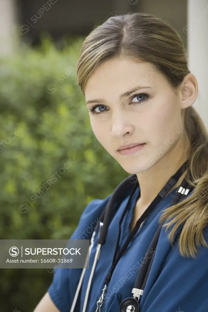 Portrait of a female nurse outdoors with stethoscope
