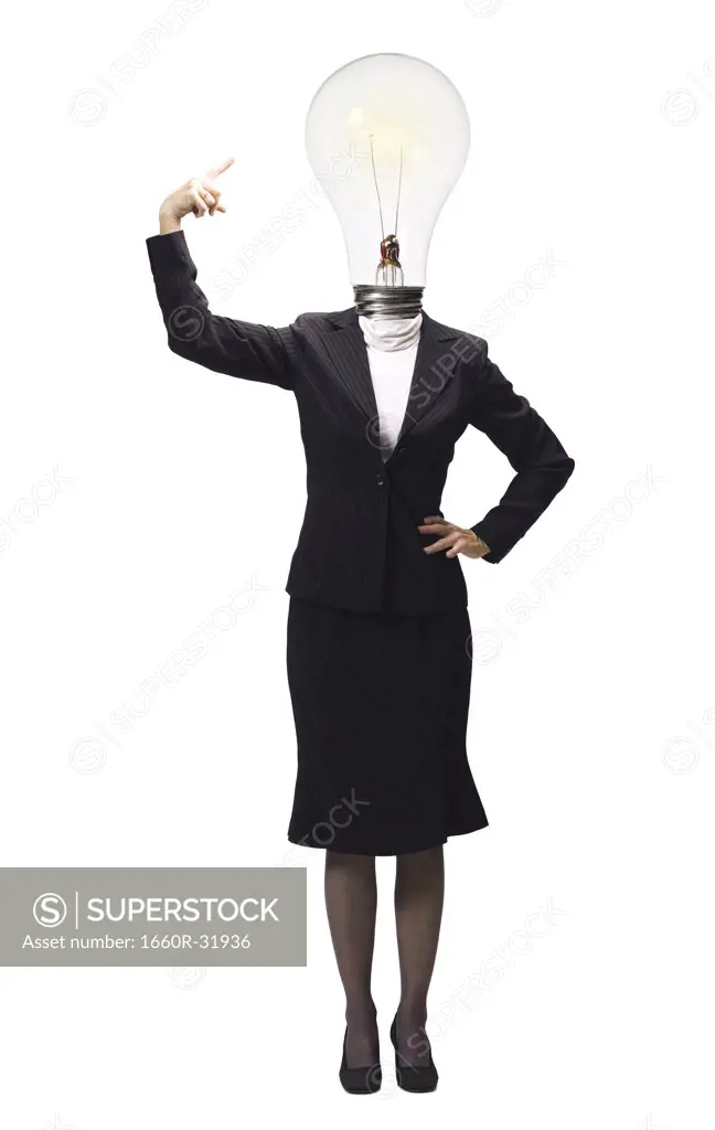 Businesswoman pointing at light bulb on head